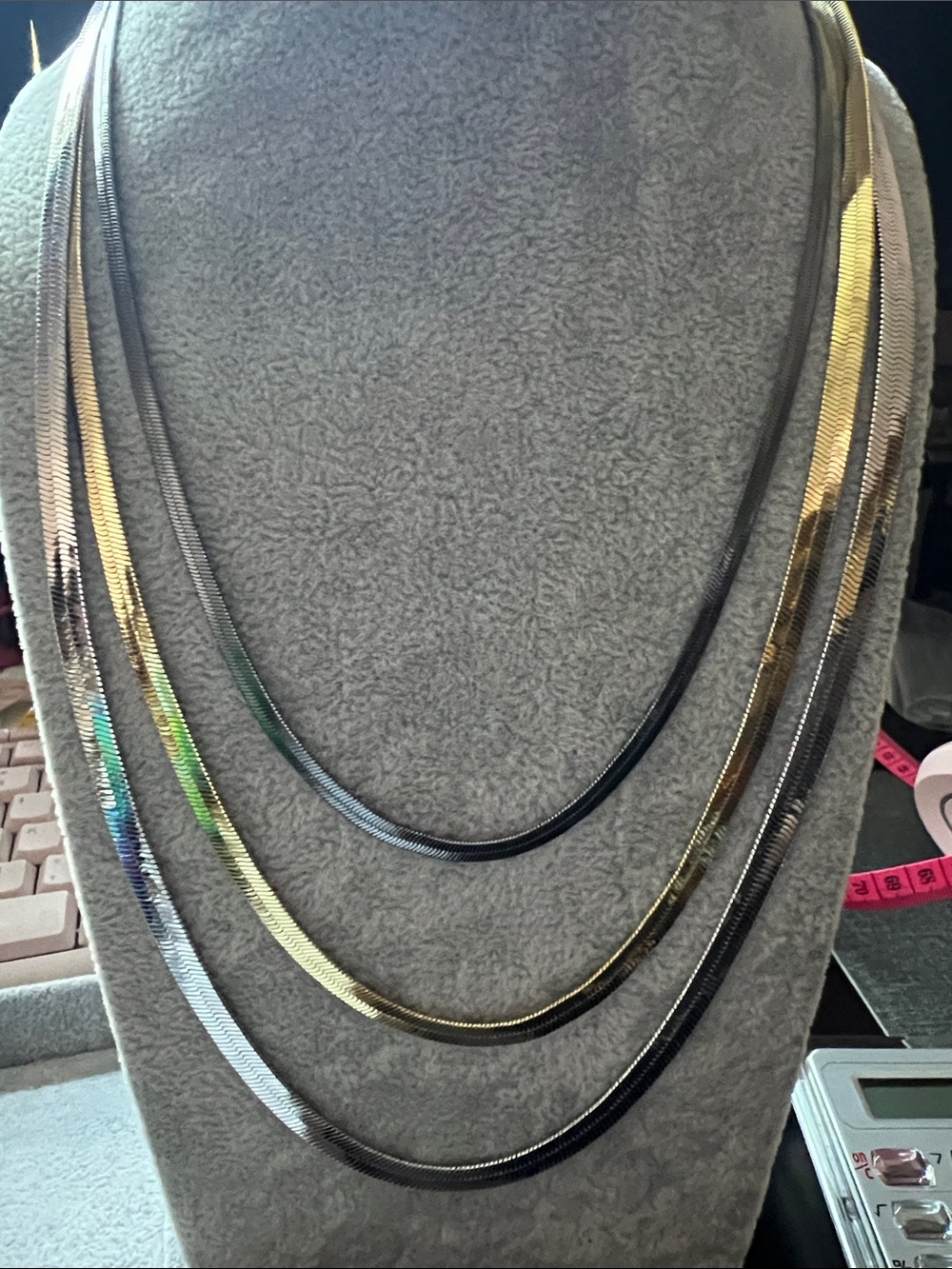 Set of three herringbone necklaces - silver, gold, and hematite